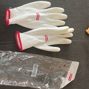White rubber Supreme gloves